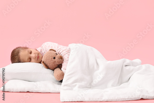 Little girl with toy and so...
