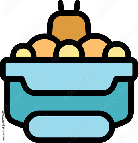 Packed lunchbox holding round food items and a small honey jar, ready for a meal