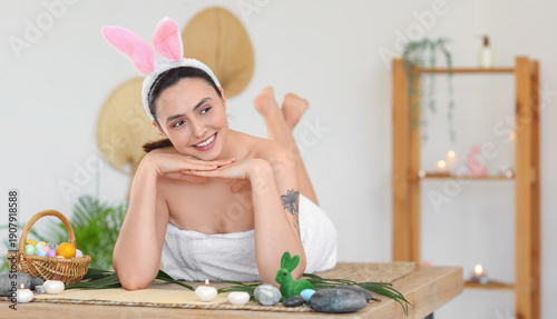 Young woman with bunny ears...