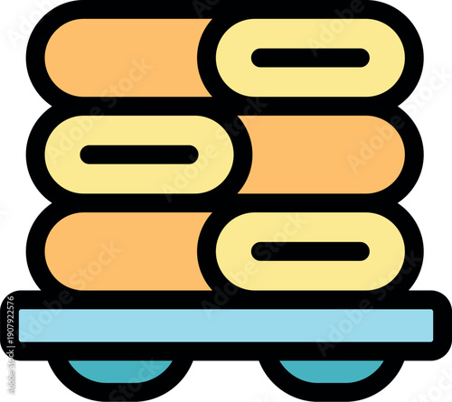 Stacked rolls of colorful fabric resting on a wheeled platform, ready for processing in a textile factory