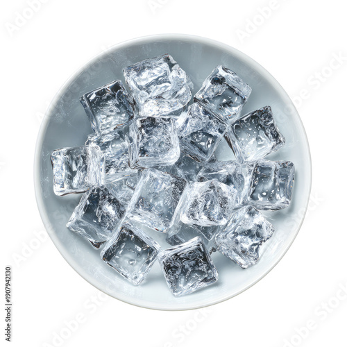 Overhead shot of a white bowl filled with numerous square, clear ice cubes