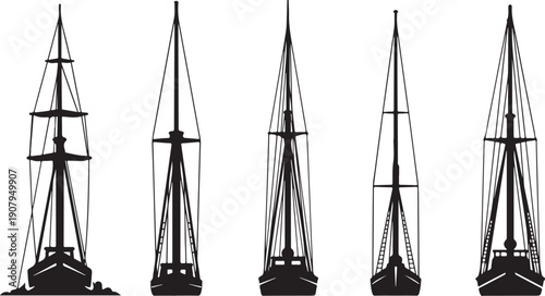 Silhouette of four sailboats on the water at sunset