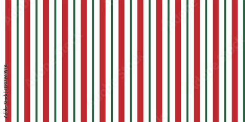 Christmas seamless pattern with a classic candy cane design with alternating red and green diagonal stripes on a white background, perfect for festive holiday themes.