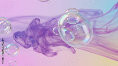 Floating soap bubbles with purple ink swirl on a gradient background, representing abstract texture and dynamic flow