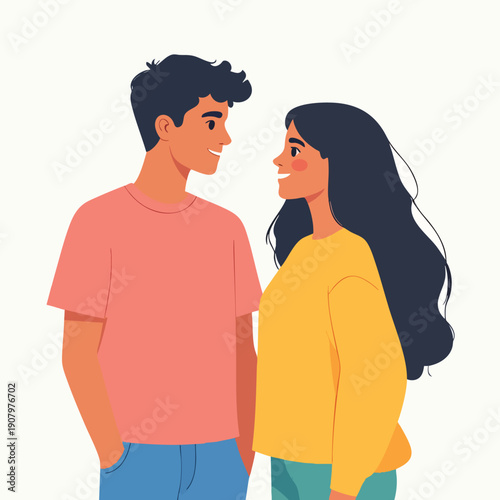 A young couple standing together facing each other in a relaxed casual setting
