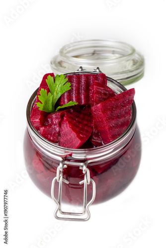 Sliced red beets in a jar -...