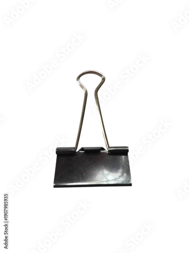 Simple Black Binder Clip Placed on a Flat Surface for Organizing Papers and Documents in an Office Environment
