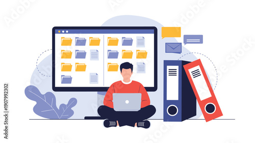 Professional man sitting cross-legged working on a laptop in front of a computer screen filled with digital folders next to office binders for data.