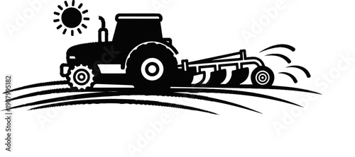 Tractor plowing field under a sunny sky