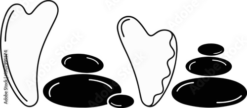 Two contour gua sha tools with stacked smooth stones for relaxation