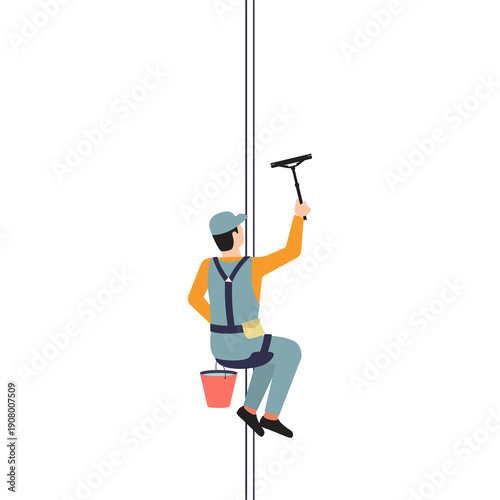 Male window cleaner in uniform hangs from a safety rope with a scraper in his hand