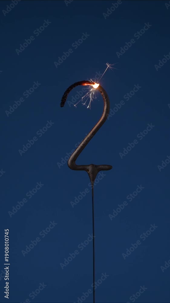 custom made wallpaper toronto digital2 years celebration festive footage made with sparkler in the form of number Two. Vertical composition.