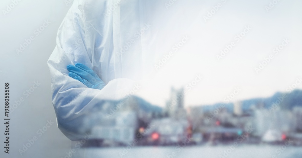 Fototapeta premium Composition of midsection of person wearing ppe suit, with blurred city and copy space