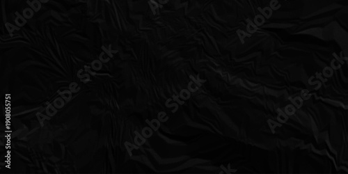 Dark black crumpled paper texture background. black crumpled and top view textures can be used for background of text or any contents.