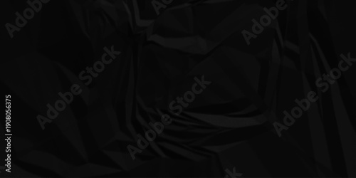 Dark black crumpled paper texture background. black crumpled and top view textures can be used for background of text or any contents.