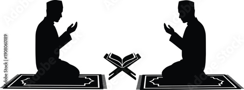 Silhouettes of two men praying with holy book on prayer mats