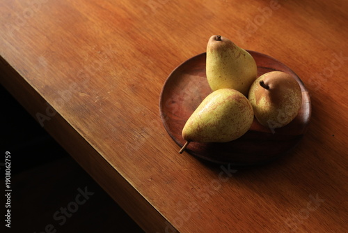pears on a wooden table