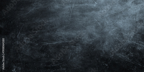 Dark blue texture background with heavy scratches moody atmosphere artistic brush strokes modern art dramatic effect black and gray tones.