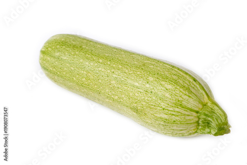 Green fresh zucchini on a w...