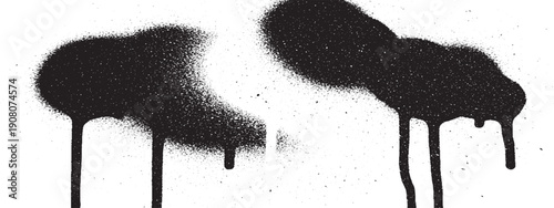 Black spray paint drips and splatters on a white background.