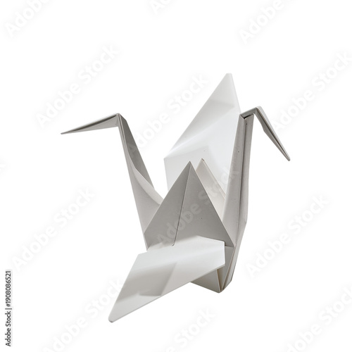 White Origami Crane Crafted From Paper in a Simple Design on a Flat Surface