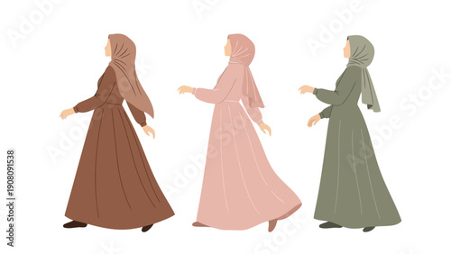 Three women walking together in traditional long dresses and headscarves.