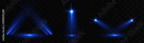 Blue stage spotlights with glowing beams and lens flares on dark opaque background, concert lighting abstract effect.