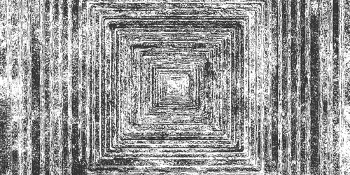 Black and white textured concentric squares receding into a dark center with vertical lines
