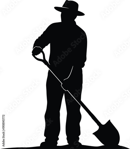 Farmer silhouette digs with shovel in field labor activity outdoors