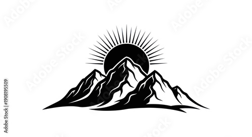Mountain range silhouette with rising sun