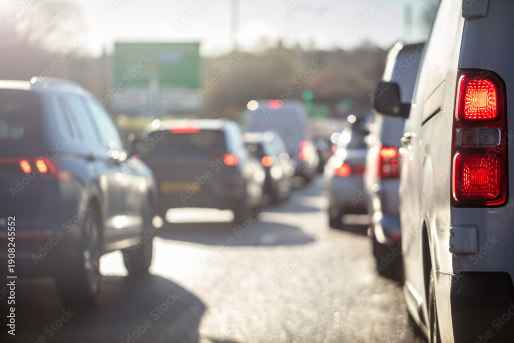 Naklejka premium Traffic jam congestion with rows of cars on highway or motorway in rush hour