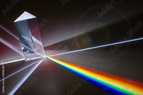 Canvas Print Prism refraction and dispersing light into rainbow spectrum on a dark background