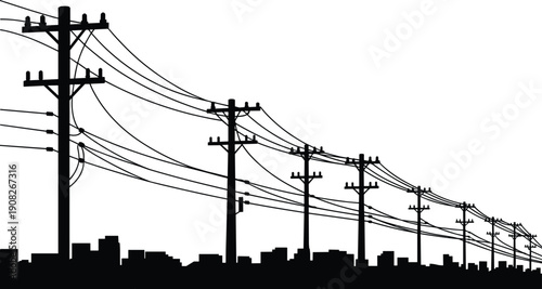 City skyline silhouette with a row of utility poles and power lines infrastructure