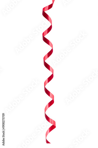 Red serpentine streamer on white background. Party decoration