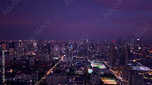 Wallpaper Mural Aerial view evening cityscape with modern skyscrapers and road traffic Bangkok Thailand. Torontodigital.ca