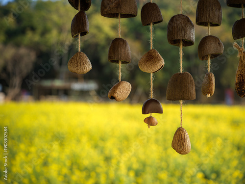 Foto Wooden Wind Chime by the Field
