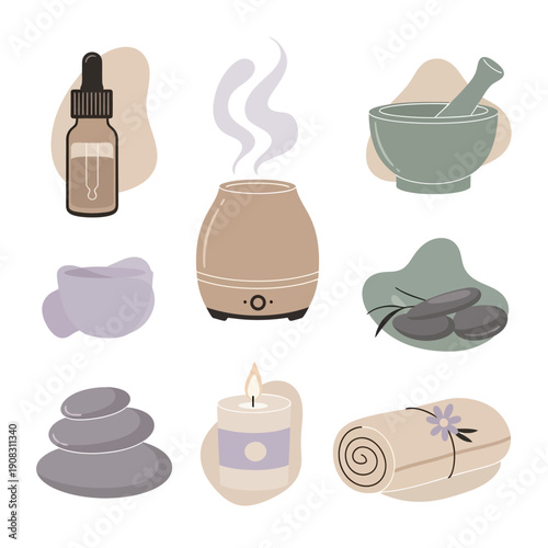 Spa and wellness items including diffuser, essential oil, massage stones, and candle