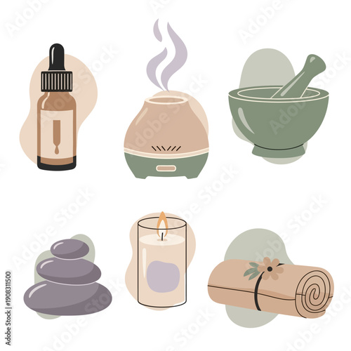 Spa and wellness items including diffuser, essential oil, massage stones, and candle