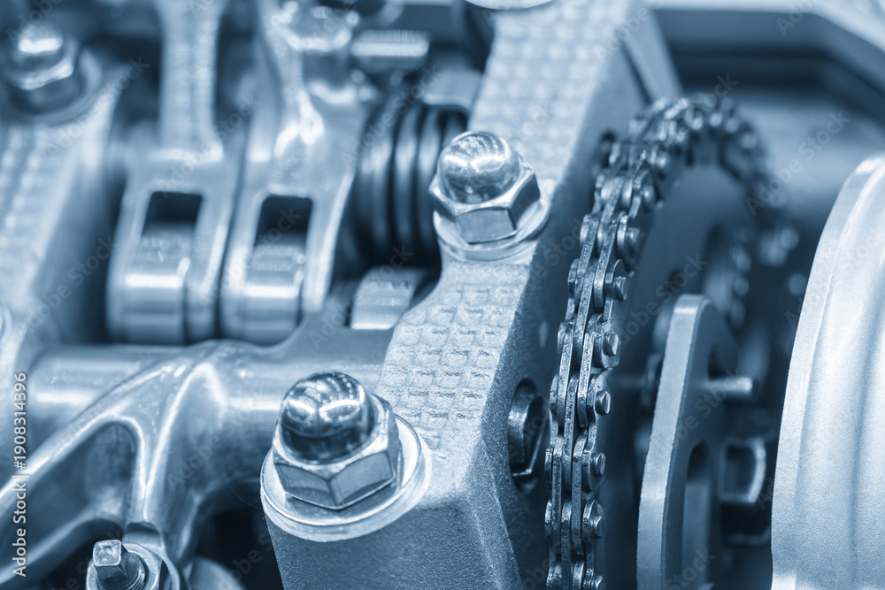 Fototapeta premium Close Up of Automotive Cylinder Head Parts in Light Blue Industrial Scene