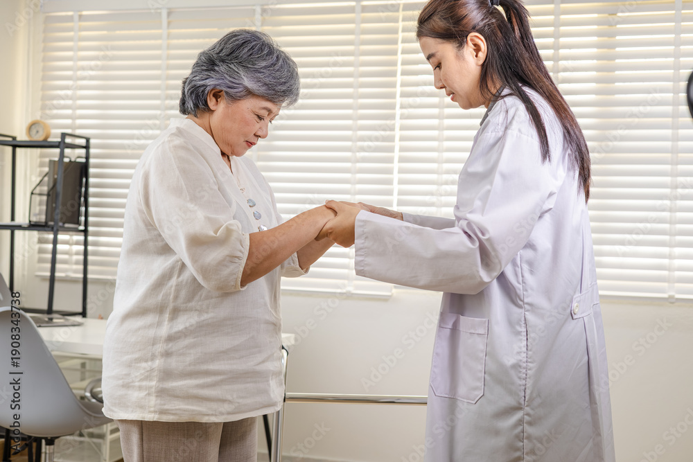 Obraz premium Elderly patient rehabilitation in clinic, doctor and caregiver support walker walking practice, balance training, fall prevention plan, mobility improvement, follow up monitoring for safe recovery