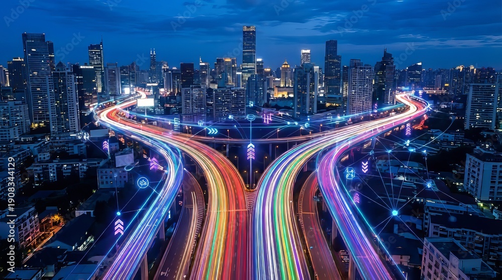Fototapeta premium Vibrant cityscape at dusk with illuminated highway interchange and skyscrapers
