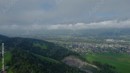 Aerial view around the mountains in Liechtenstein on a cloudy summer morning
