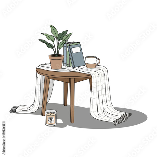 Cozy table with books, plant, mug, and candle - hygge lifestyle, home decor, relaxation