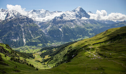 Foto auf Acrylglas Alpen Majestic Swiss Alps Landscape with Green Valleys and Snow-Capped Peaks  © tereshkov