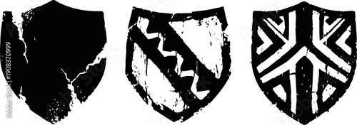 black and white medieval shields with various heraldic patterns and symbols