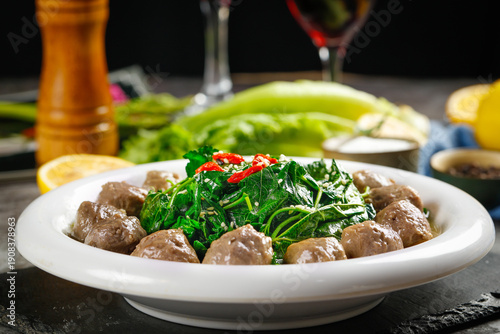 Valokuva Handmade Chaoshan Beef Balls with Greens - Traditional Chinese Cuisine