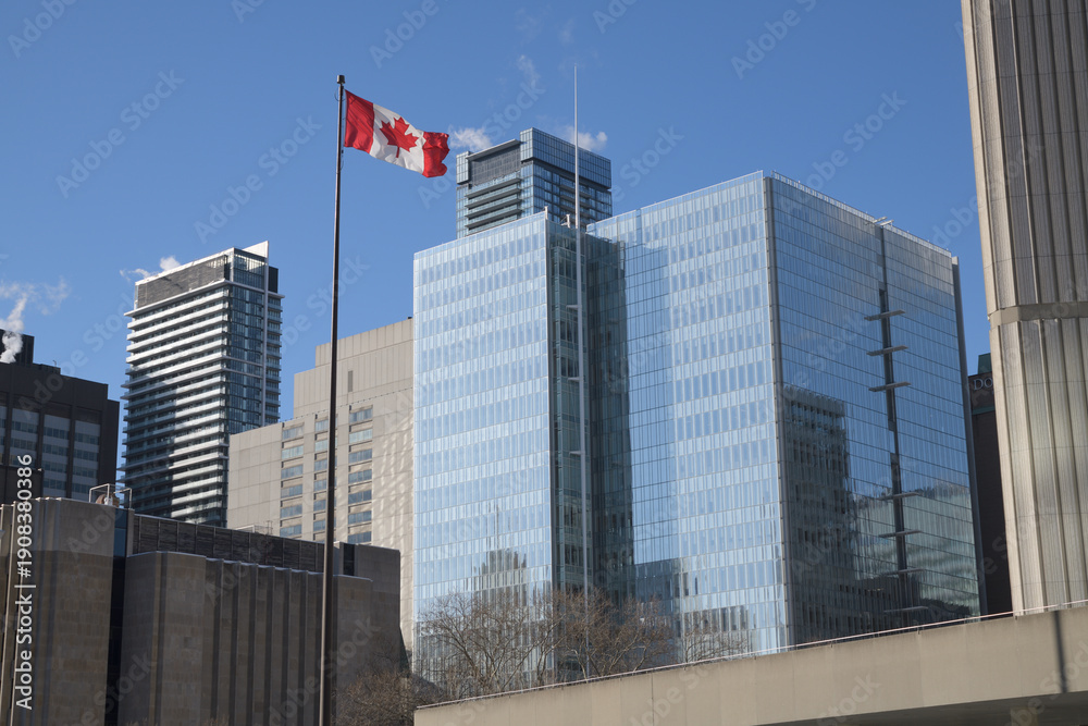 Fototapeta premium (glass building at center) Ontario Court of Justice, located at 10 Armoury Street, designed by Renzo Piano, viewed from Nathan Phillips Square, Toronto