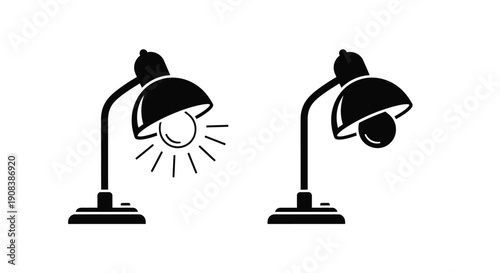 Two desk lamps one illuminated depicted in a stark silhouette