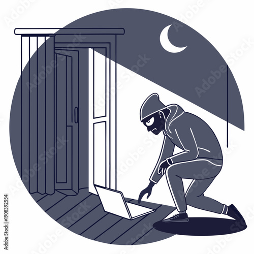 Un voleur de données vole des informations sur un ordinateur portable la nuit
