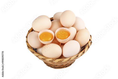 Wallpaper Mural Fresh Raw Eggs with Golden Yolks in Wicker Basket on White Background Torontodigital.ca
